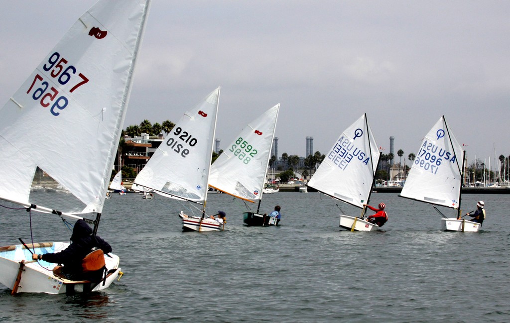 Hometown Naples Sabots mixed  it up with visiting Optimists - Charity Regatta for The Children’s Clinic 2011 © Rich Roberts http://www.UnderTheSunPhotos.com